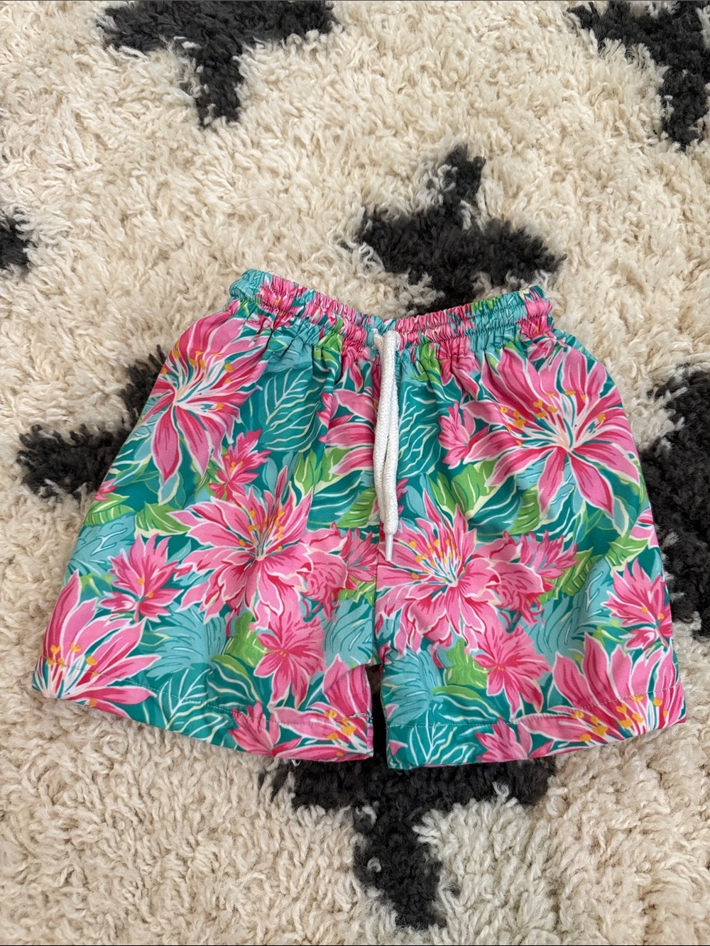 Smocked floral swim trunks